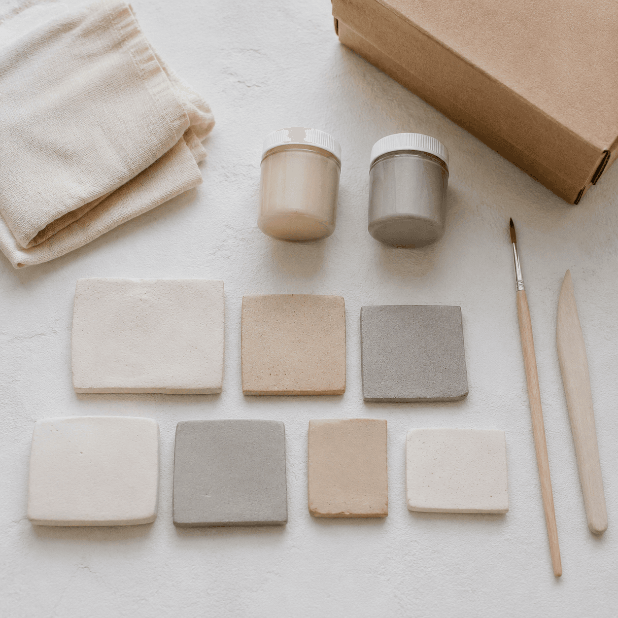 Neutral Ceramic Set Kit laid out flat